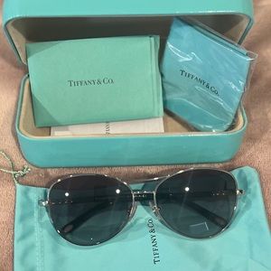 Brand new authentic Tiffany pilot sunglasses.